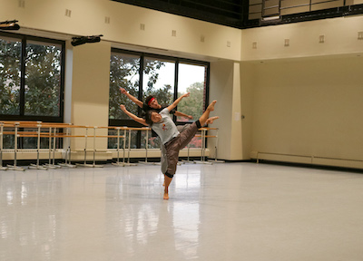 Morgan Olschewske (front) and Michael Cherry rehearsing for the dance number, "Double Octet."